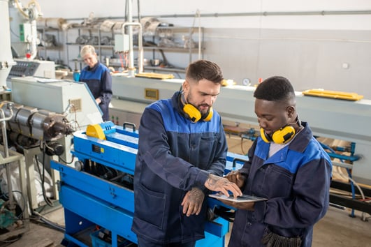 two-young-intercultural-male-workers