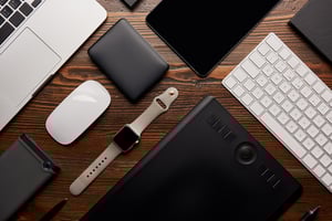 flat-lay-with-different-devices-on-wooden-workplac-2023-11-27-05-30-25-utc-2